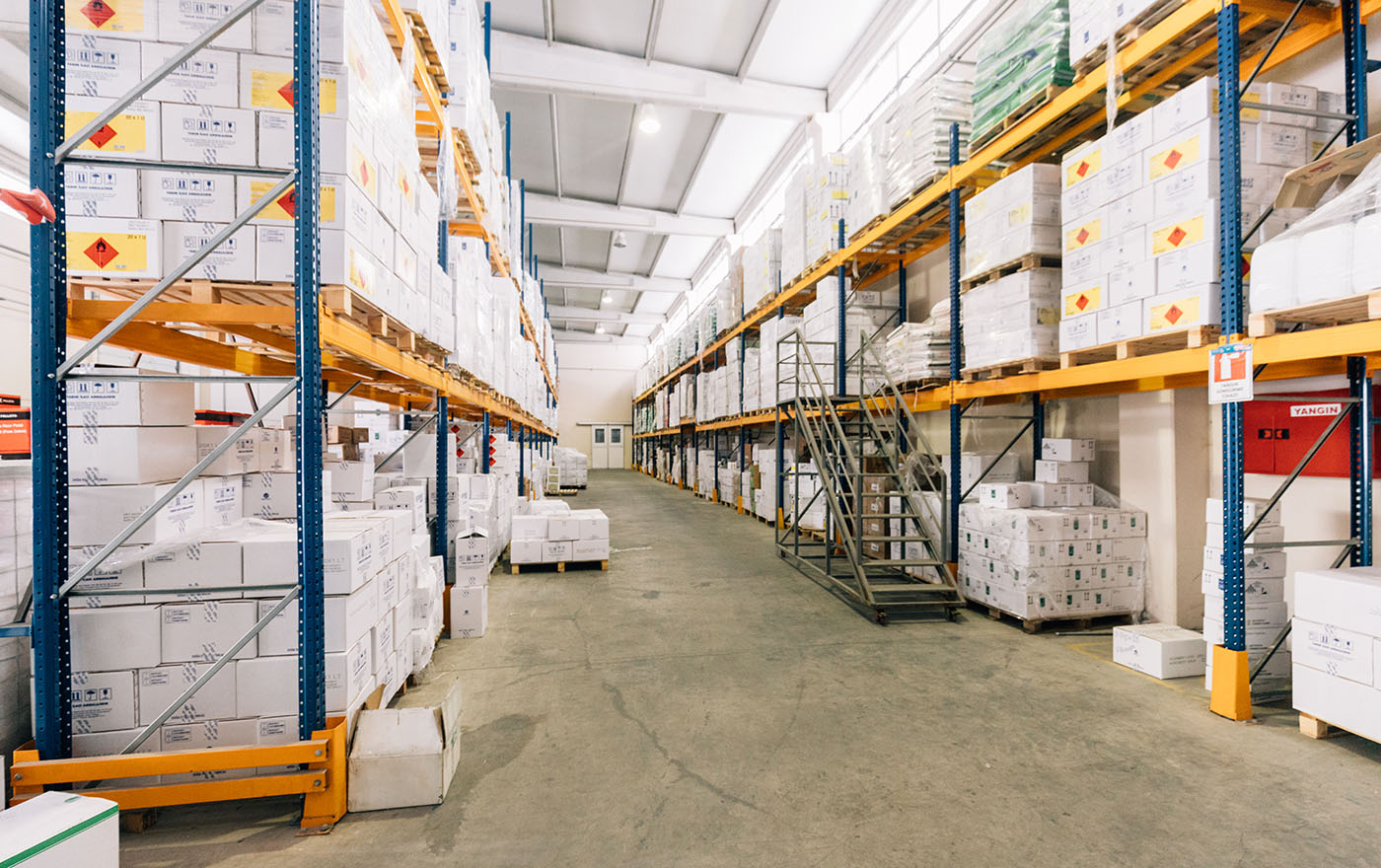 Rows of shelves with boxes in storage room of warehouse aisle background XXXL size