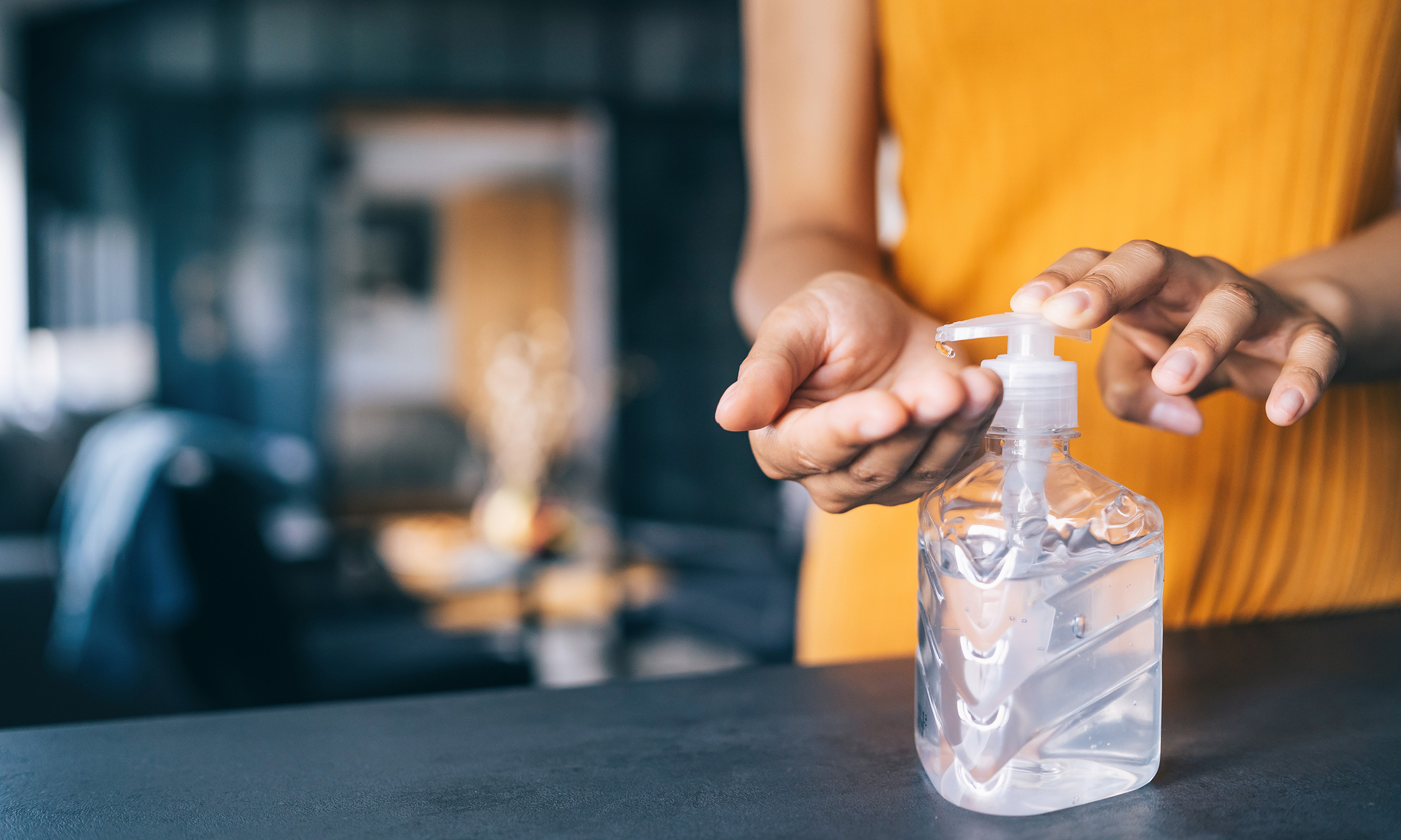 Applying hand sanitizer representing Biocides Regulatory Affairs | Sagentia Regulatory