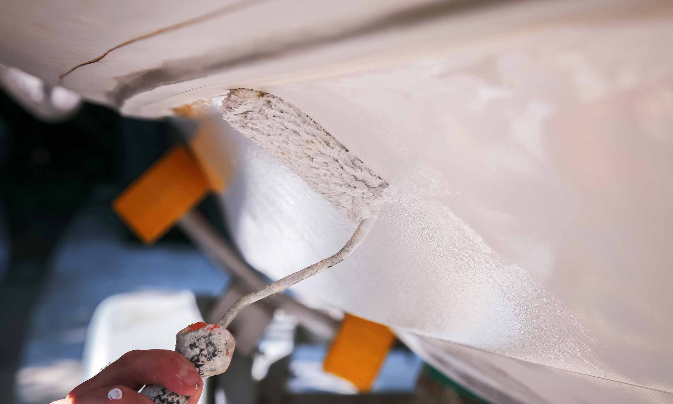 Painting a boat representing Sagentia Regulatory's biocidal and perservatives consulting services